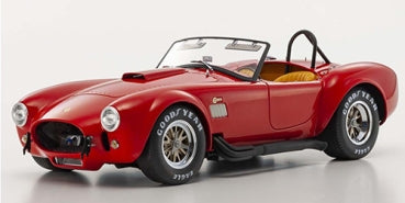 Red diecast model car with Goodyear tires, detailed interior, classic convertible design