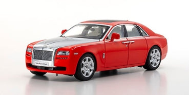 Red and silver 1:18 scale diecast luxury sedan model car on white background