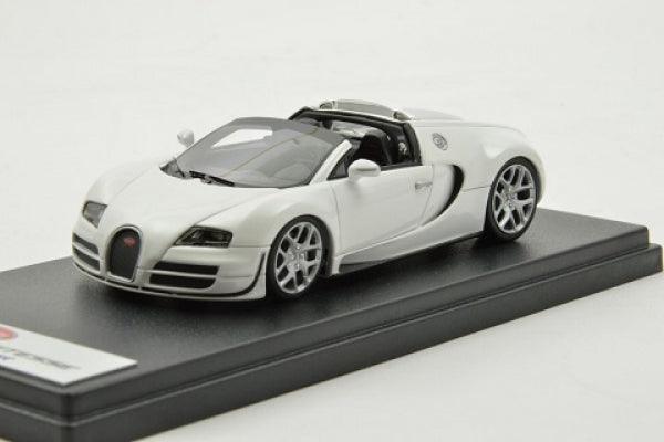 1:18 scale diecast white Bugatti Veyron convertible model car on display base