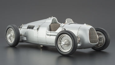 1:18 scale silver vintage race car diecast model with detailed wheels and cockpit