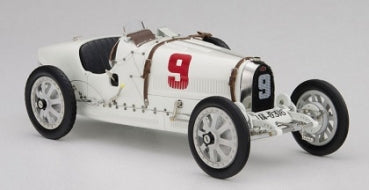 1:18 scale white vintage race car diecast model with red number 9 and leather straps