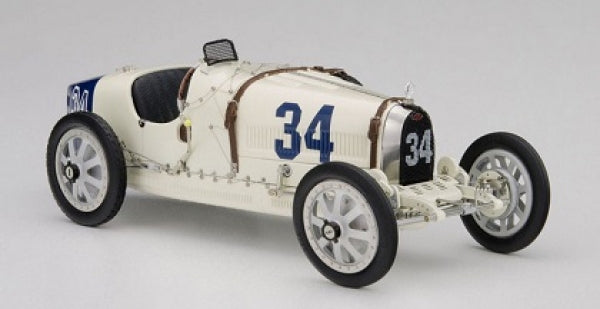1:18 scale diecast vintage race car model in white with number 34, detailed wheels and interior