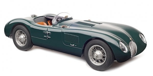 1:18 scale diecast model of a classic green vintage racing car with wire wheels and open cockpit