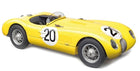 Yellow diecast model classic race car with number 20, open cockpit and wire wheels