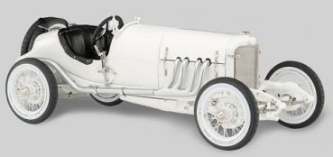 White vintage diecast model car with detailed interior and spoked wheels, 1:18 scale.