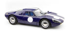 1:18 scale diecast classic race car model, blue with white racing decals, on white background