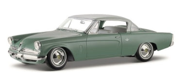 1:18 scale green diecast classic car model with chrome accents and white roof
