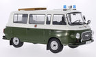 1:18 scale diecast model police van in green and white with sirens and roof details