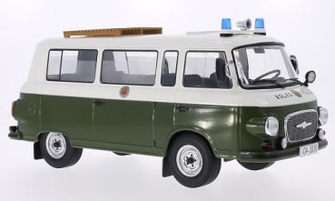 1:18 scale diecast model of a vintage green and white police van with roof lights