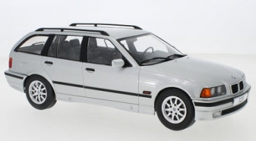 1:18 scale silver BMW E36 Touring diecast model car with roof rails and detailed wheels