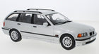 1:18 scale silver BMW touring diecast model car with detailed wheels and roof rails