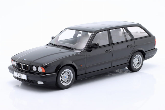 https://automodele.eu/environment/cache/images/productGfx_742707_0_0/MCG18329-BMW-540i-E34-Touring-1991-Black-Metallic-MCG-118.jpg