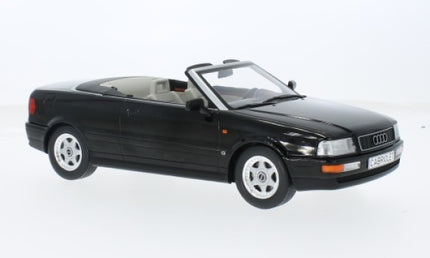1:18 scale black Audi convertible diecast model car with detailed interior on white background