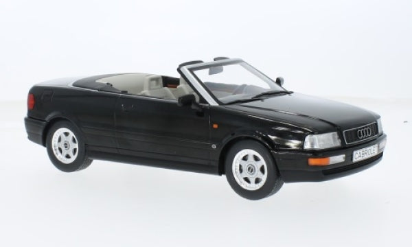 1:18 scale black Audi convertible diecast model car with detailed interior on white background