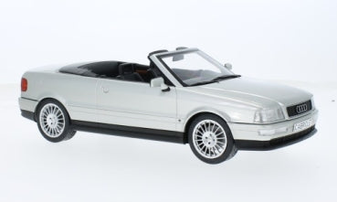 1:18 scale silver diecast convertible model car with black interior on white background