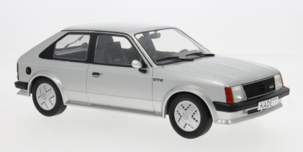 Silver diecast model car, 3-door hatchback, 1:18 scale, detailed wheels and interior