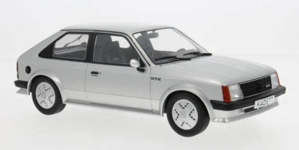 Silver diecast model car, 3-door hatchback, 1:18 scale, detailed wheels and interior