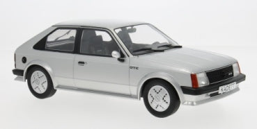 1:18 scale silver diecast model car hatchback with detailed wheels and black trim