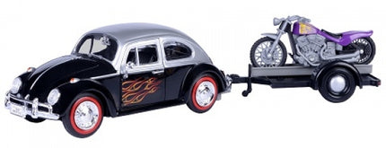 Diecast black vintage car with flame decals towing purple motorcycle on trailer, 1:18 scale model.