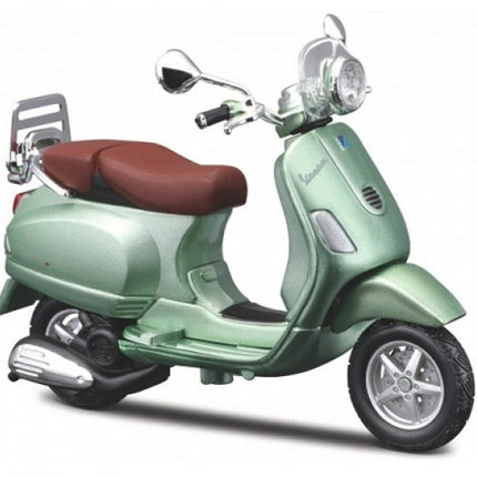 Green diecast model Vespa scooter with brown seat, detailed mirrors and wheels