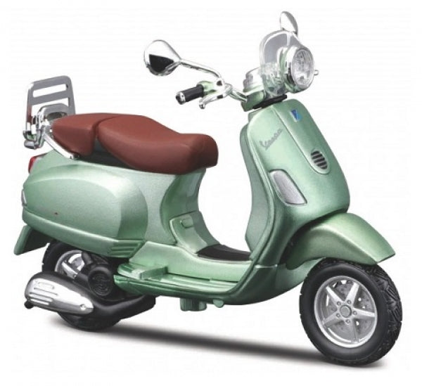 Green diecast model Vespa scooter with brown seat, detailed mirrors and wheels