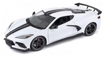 White diecast model sports car with black racing stripes and rear spoiler, 1:18 scale