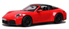 Red 1:18 scale diecast model sports car with black roof and detailed rims