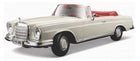 1:18 scale classic white convertible diecast model car with red interior, detailed design