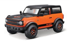 1:24 scale orange and black diecast SUV model car with Harley-Davidson logo details