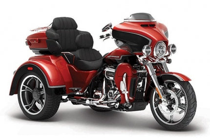 Red diecast model trike motorcycle with detailed black seats and chrome accents