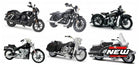 Six diecast model motorcycles in various styles, including cruiser and touring bikes, on white background.