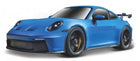 Blue diecast model sports car with black wheels and rear spoiler, 1:18 scale collectible