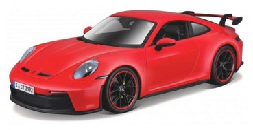 Red diecast model sports car with black rims and rear spoiler, 1:18 scale