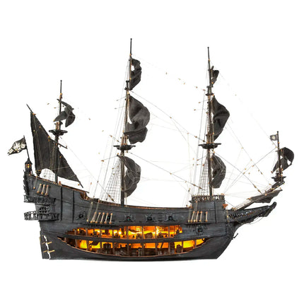 https://cdn.shopify.com/s/files/1/0622/6942/3871/products/Maqueta_barco_de_madera_holandes_errante_occre_luces_40f1e7e3-91b8-4a54-8411-369c20942368.webp?v=1774353449
