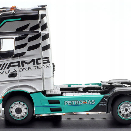 https://a.allegroimg.com/original/111e14/f79cd2cf469fa90f8873b35cbc9c/Mercedes-Benz-Actros-MP4-77-Truck-2012-AMG-Petronas-F1-Team-Hachette-1-43-Marka-Hachette