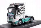 https://a.allegroimg.com/original/113102/4fb6395e4b28959f21fa85f3a861/Mercedes-Benz-Actros-MP4-77-Truck-2012-AMG-Petronas-F1-Team-Hachette-1-43