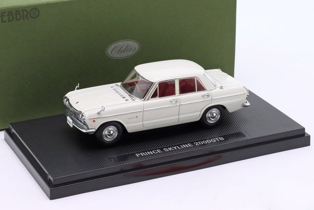 https://a.allegroimg.com/original/11883b/bb08f1fe44f4907540c15b5cb994/Nissan-Prince-Skyline-2000GT-B-2000GTB-2000-GT-B-GTB-1966-White-Ebbro-1-43