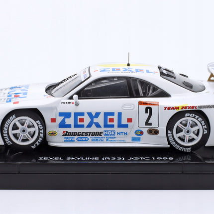 https://a.allegroimg.com/original/1145ac/ae741fbd4fd7b87fa5e56f155bcd/Nissan-Skyline-GT-R-R33-Zexel-2-JGTC-1998-Kageyama-Suzuki-Ebbro-1-43-Kod-producenta-44193
