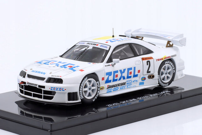 https://a.allegroimg.com/original/11c243/5c443f2344f5818df47351dbb7dc/Nissan-Skyline-GT-R-R33-Zexel-2-JGTC-1998-Kageyama-Suzuki-Ebbro-1-43