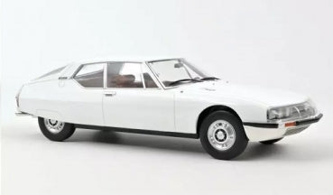White diecast model car, classic coupe design, displayed on plain background.