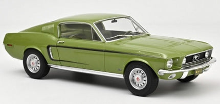 Green 1:18 scale diecast model car, classic fastback, detailed collector's item on white background
