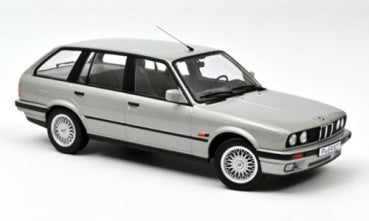 Silver diecast BMW station wagon scale model car with detailed wheels and black trim