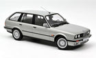 1:18 scale silver BMW station wagon diecast model car with detailed wheels and trim
