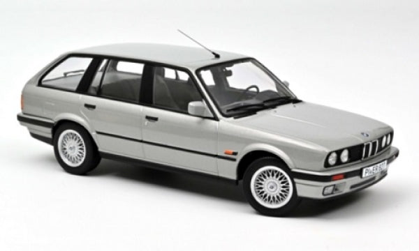 1:18 scale silver BMW station wagon diecast model car with detailed wheels and trim