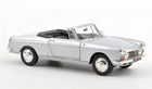Silver diecast convertible model car with detailed wheels and interior on white background