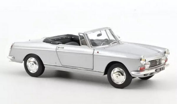 Silver diecast convertible model car with detailed wheels and interior on white background