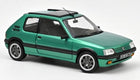 Green diecast model car in 1:18 scale with sunroof, black trim, and detailed wheels on white background