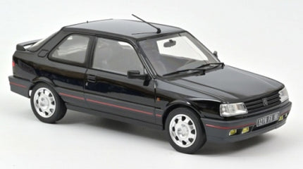 Black diecast model car 1:18 scale, sport sedan with silver wheels on white background