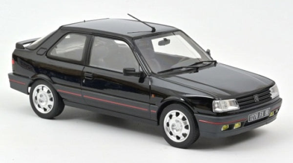 Black diecast model car 1:18 scale, sport sedan with silver wheels on white background