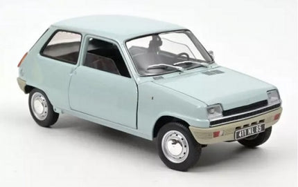 Light blue diecast model car in 1:18 scale with detailed interior and vintage design